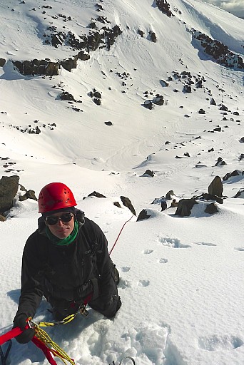 Karl at the belay after a good lead  through snow and rocks.  