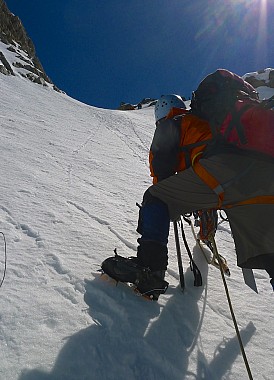 Climbing out onto easier slopes in the upper couloir.