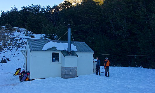 Lawrence Hut surrounded by very frosty snow.