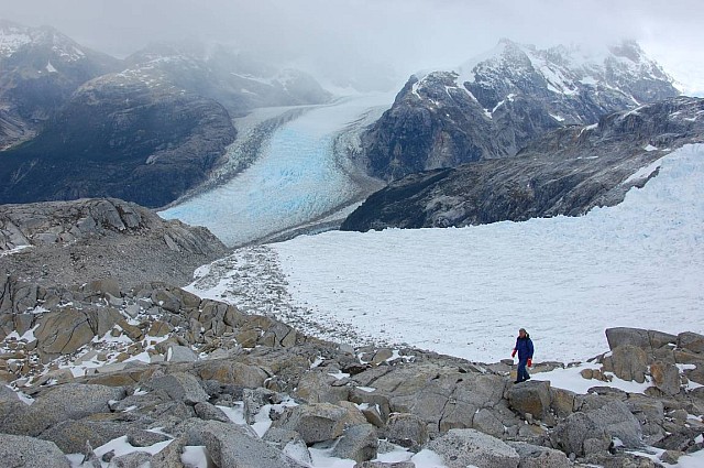 Peter Radcliffe by the edge of the shrunken Leones glacier.  The other two branches can be seen beyond.  Heim’s camp is out of sight on the left